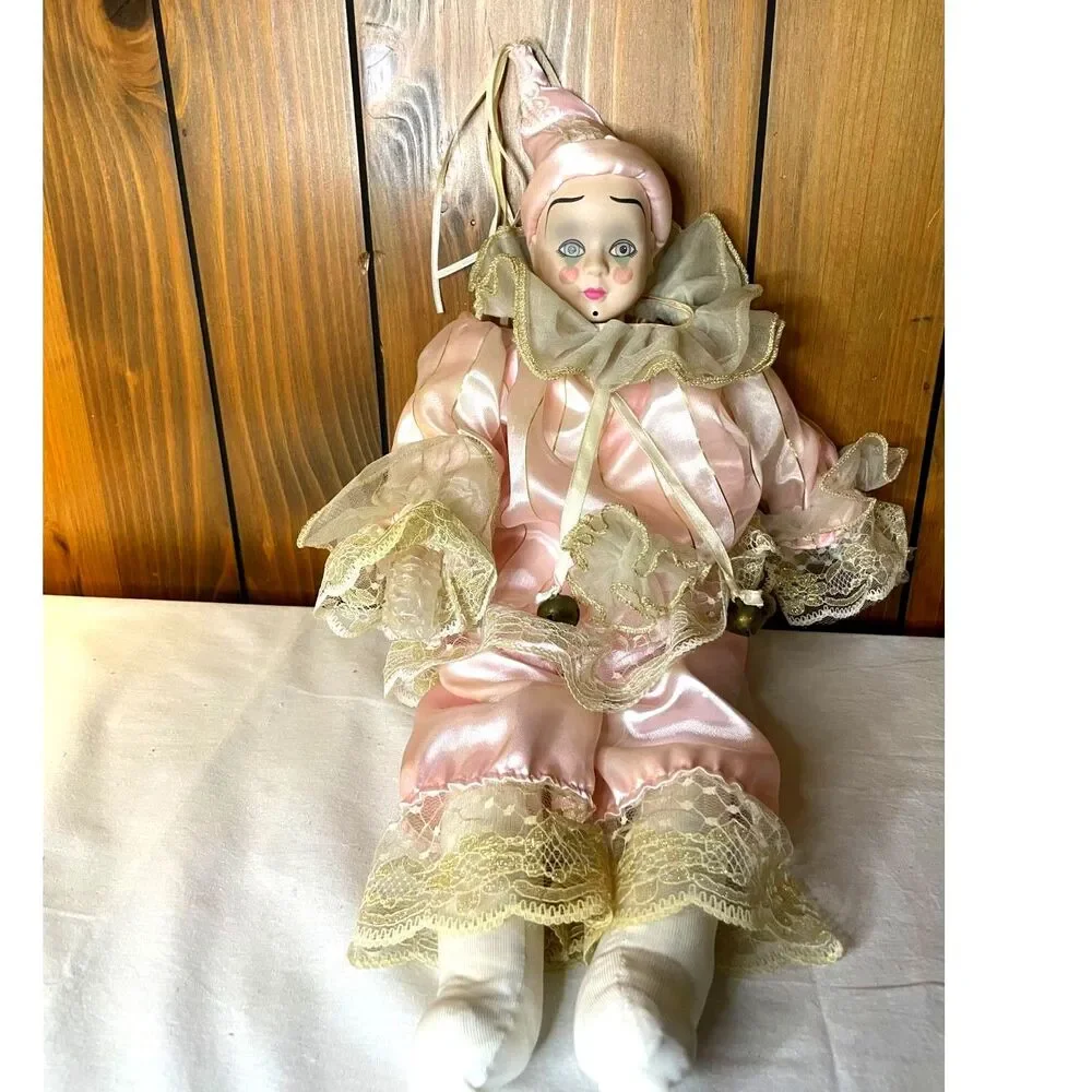 Porcelain Pierrot clown doll.